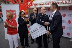 Salvation Army Bookbag give away and check presentation