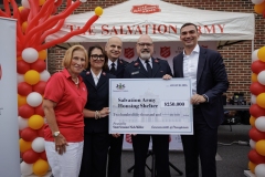 Salvation Army Bookbag give away and check presentation